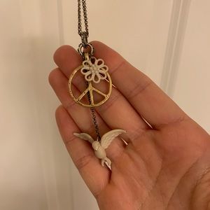 Long chain necklace with dove, flowers, peace